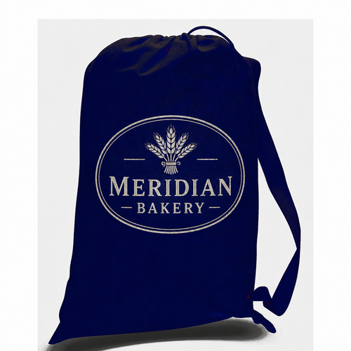 Navy drawstring laundry bag printed with a Meridian Bakery logo